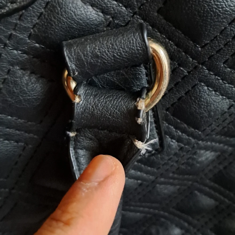 Black Quilted Handbag with Gold Accents